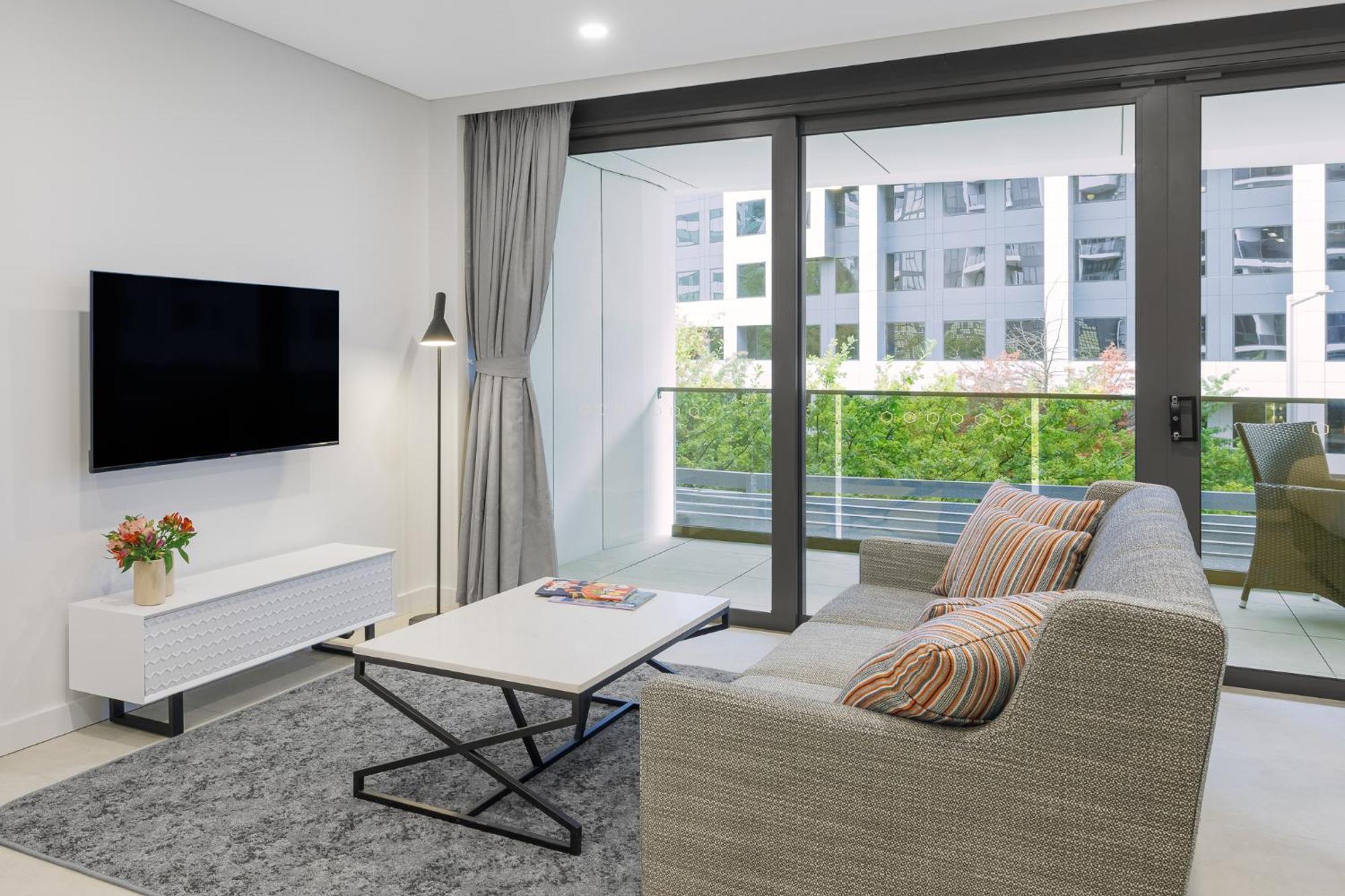 Meriton Suites 堪培拉 外观 照片 Living room